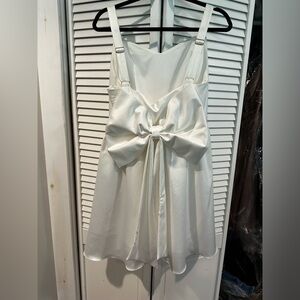 White dress with bow on back